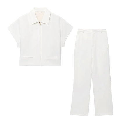 TFMLN 2025 black two-piece set — zip-up top and wide-leg pants.