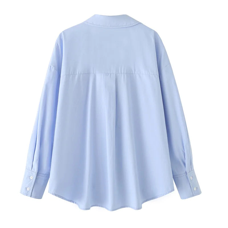 TRAF 2025 oversized blue shirt for women. Long sleeves, button-up, Korean casual style — perfect for spring.