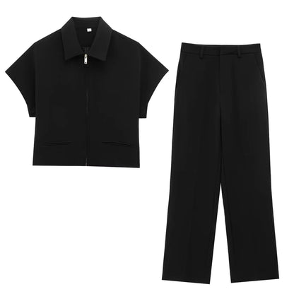 TFMLN 2025 black two-piece set — zip-up top and wide-leg pants.