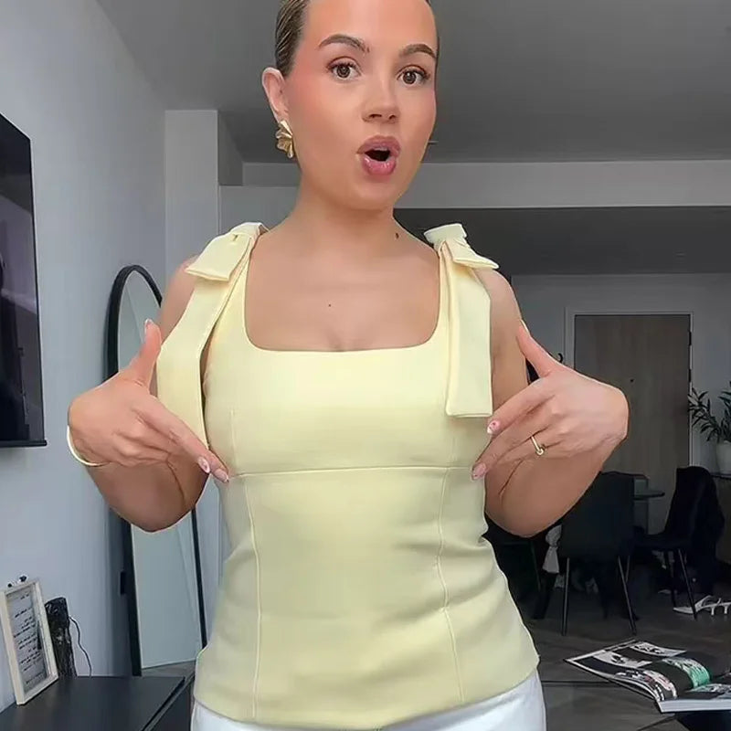 TRAF butterfly crop top for women — yellow or white, sleeveless, backless, with cute bow and off-shoulder design. Perfect for summer.
