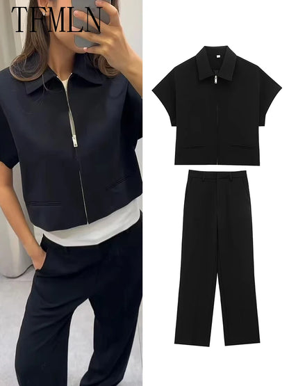 TFMLN 2025 black two-piece set — zip-up top and wide-leg pants.