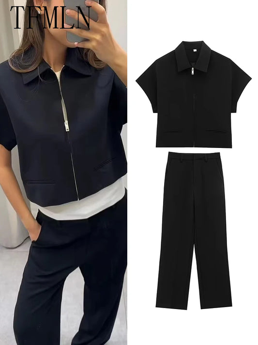 TFMLN 2025 black two-piece set — zip-up top and wide-leg pants.